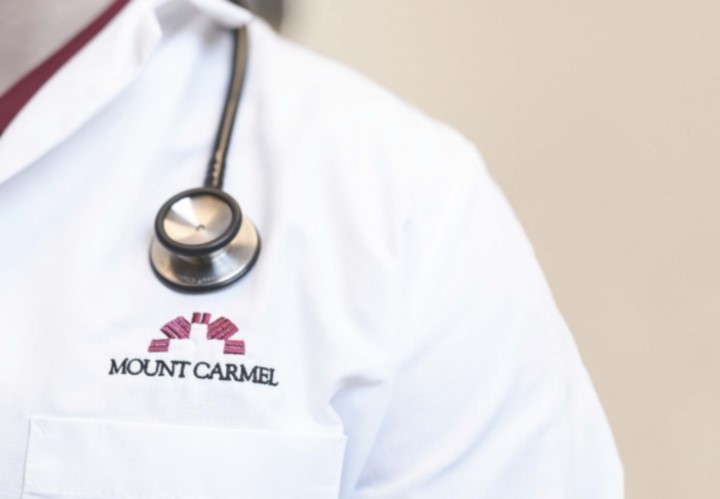 Person with a white uniform and a stethoscope