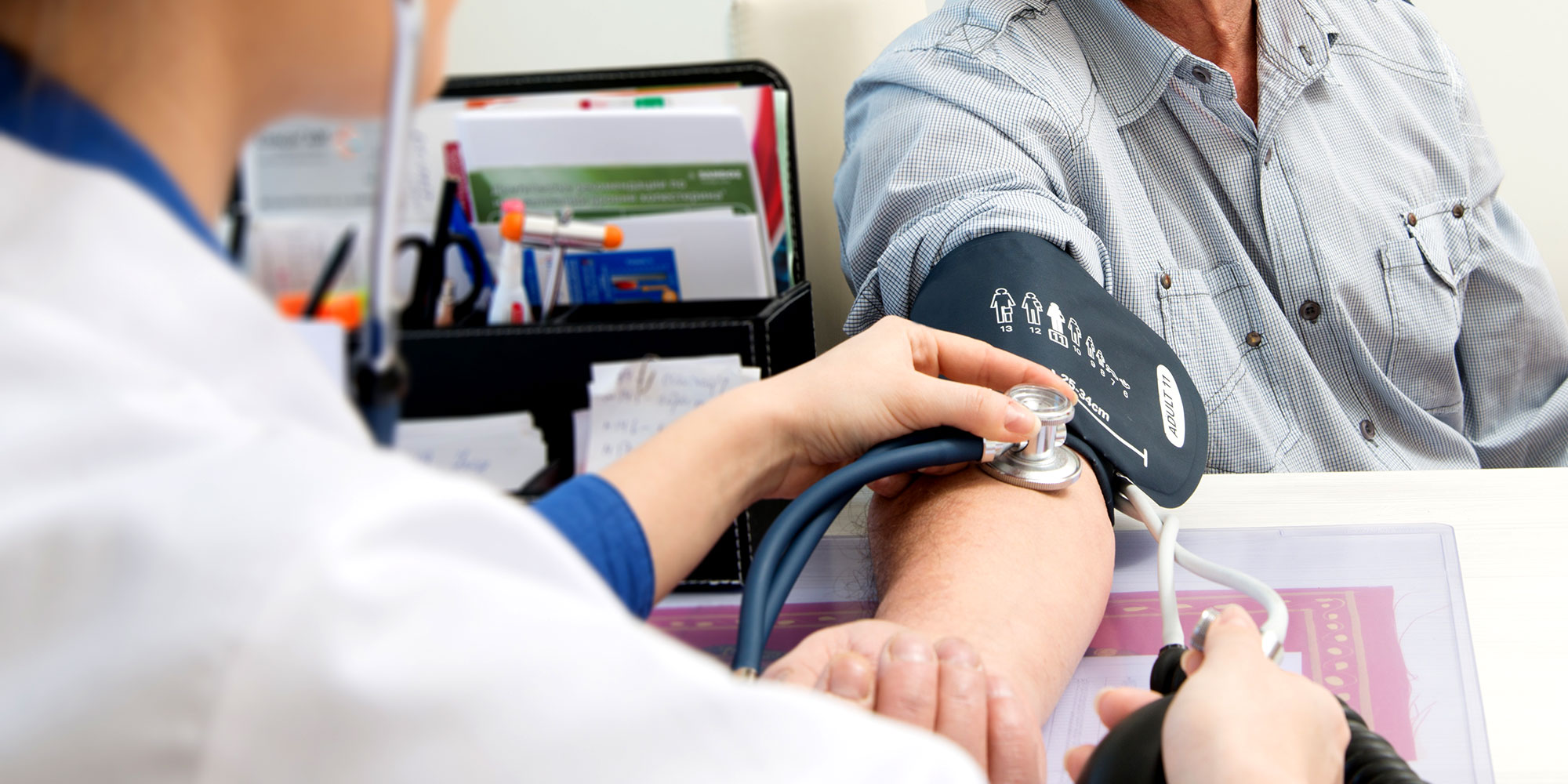patient getting blood pressure taken